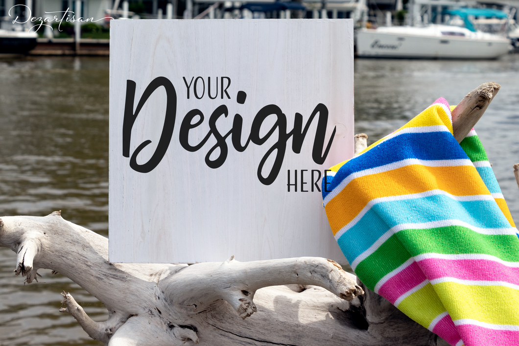 Nautical White Square Wood Sign With Beach Towel Mockup At Lake Digital Design PNG in 3:2 format | 3000 x 2000 Pixels | 300 DPI